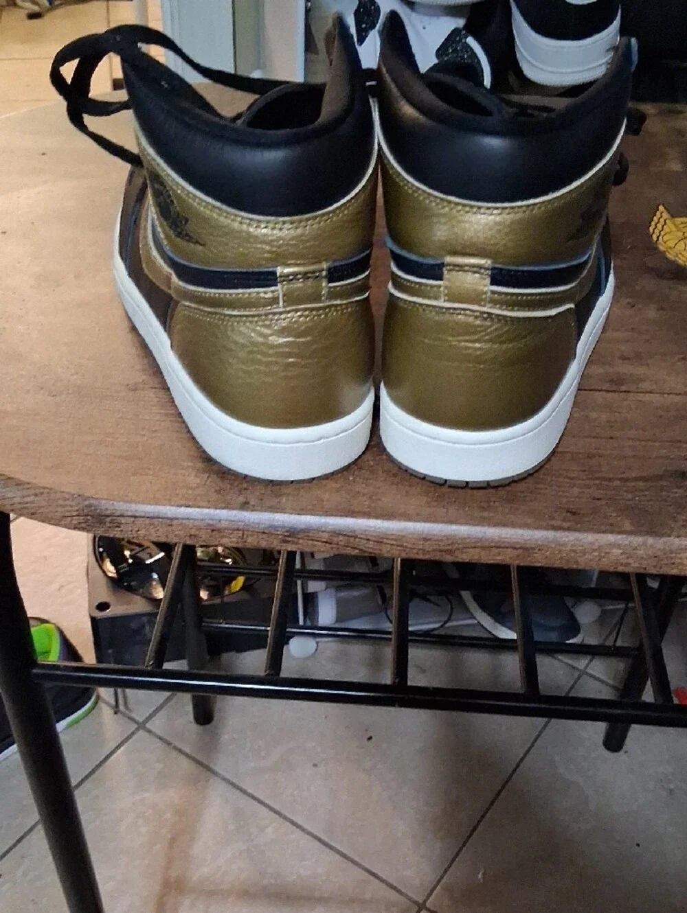 Jordan Men’s Mid-Top Sneakers in Black and Metallic Gold